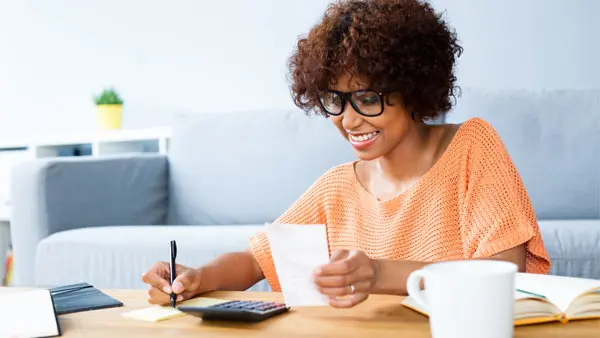 woman paying down debt